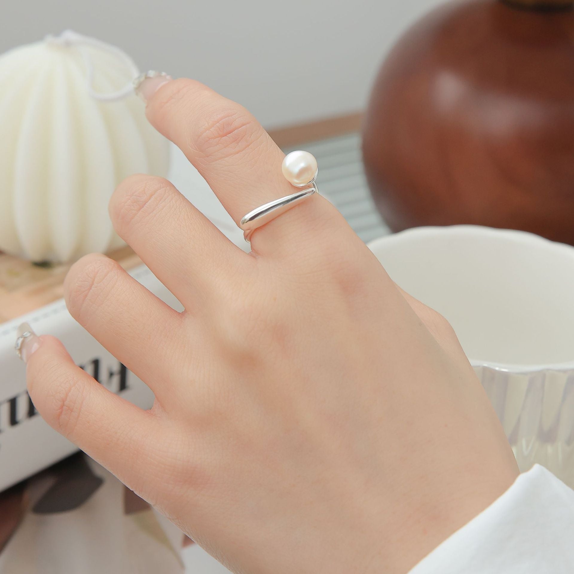 Sterling silver interlocking pearl ring
