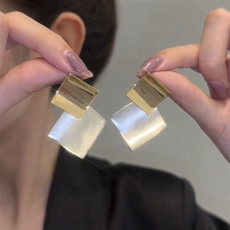 Square clashing earrings