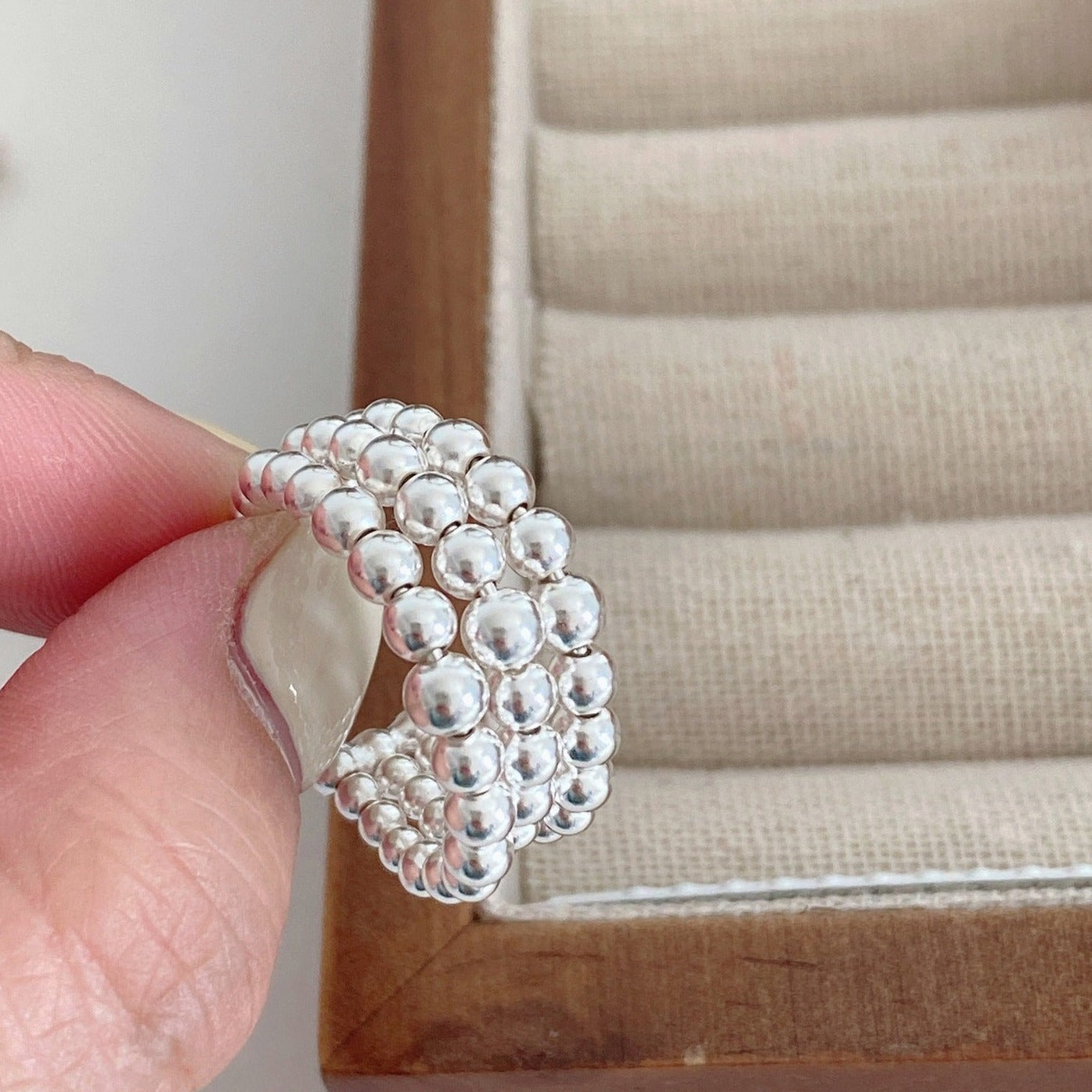 Multi-layered small silver ball ring