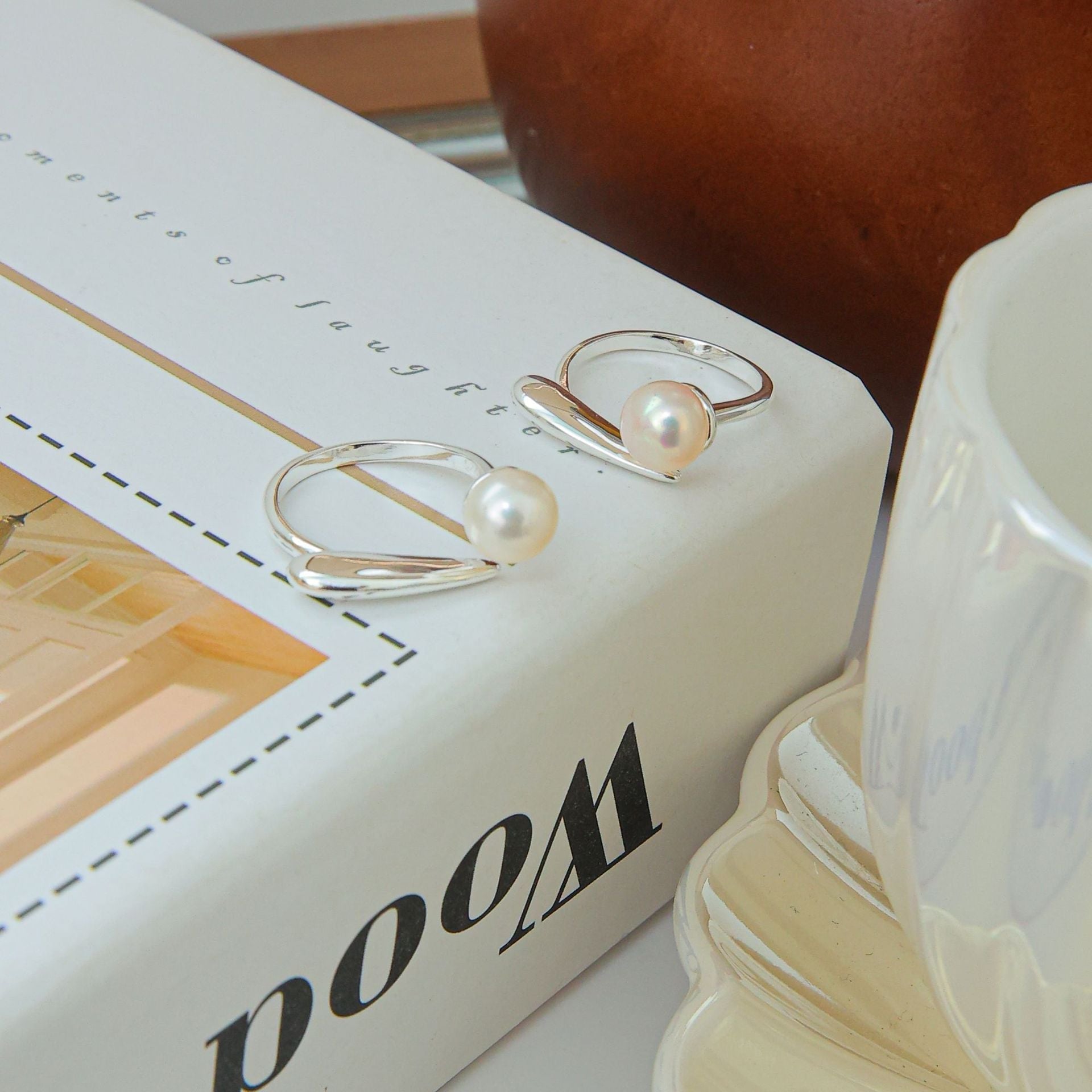 Sterling silver interlocking pearl ring