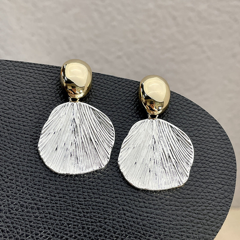 Gold and silver shell earrings