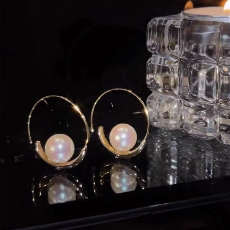 Large hoop pearl earrings