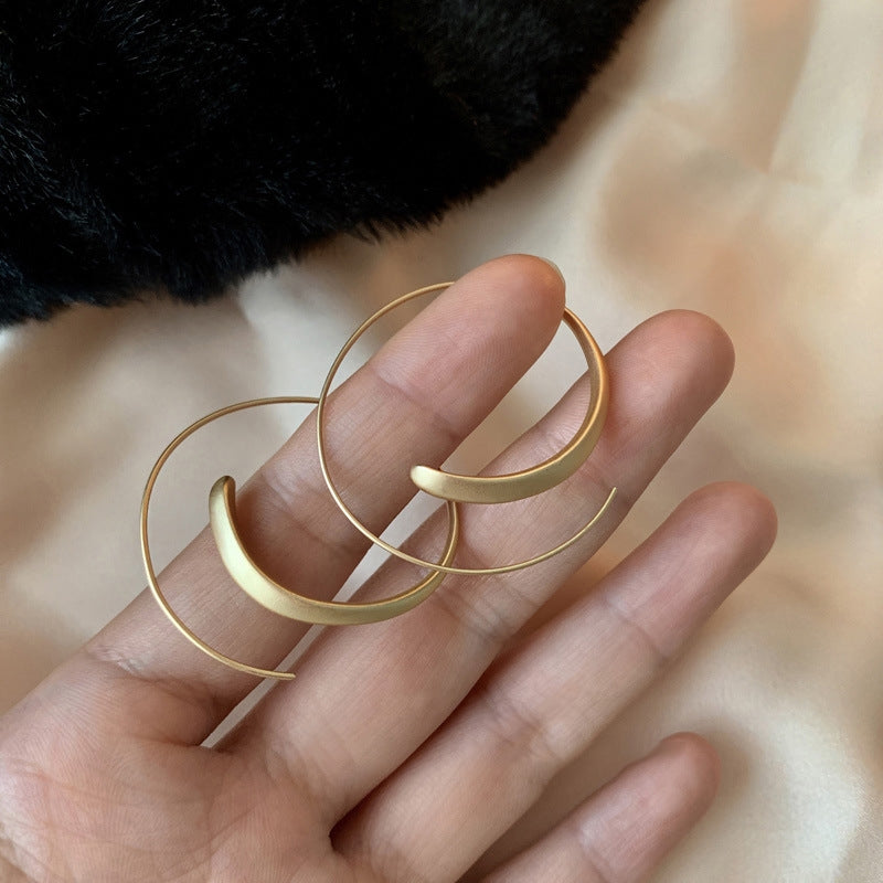 Large curved earrings