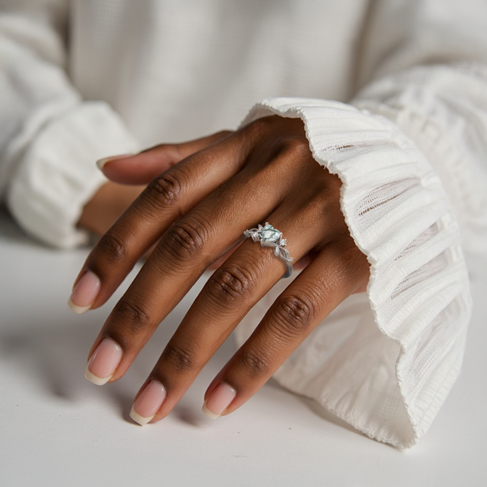 Heart-shaped gemstone ring in sterling silver