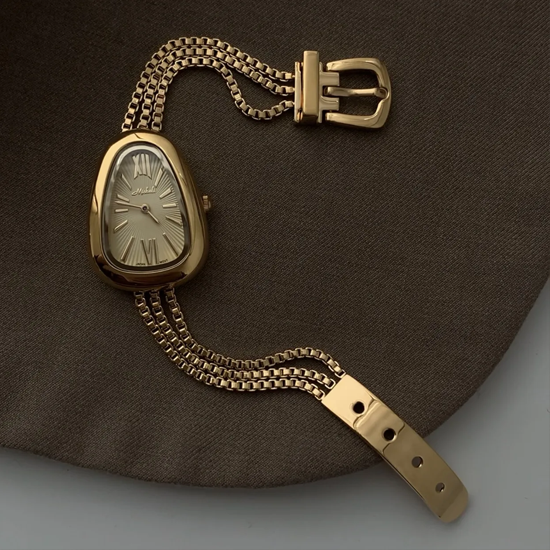 Golden Serpenti Timepiece – Quartz Watch with Steel Tassel Chain Design