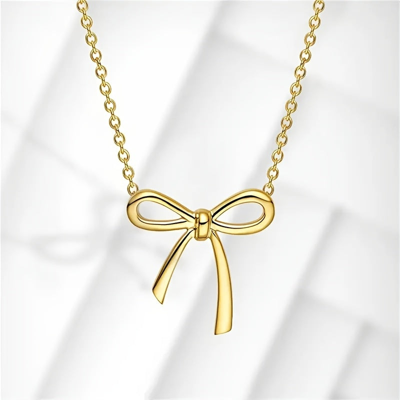 CharmKnot Delicate Gold Bow Necklace with Sophisticated Spark