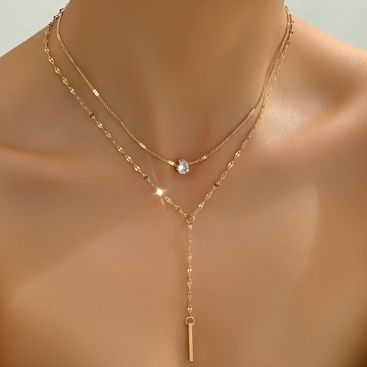 Golden Multi-Strand Pendant Necklace with Sparkling Rhinestone Accents