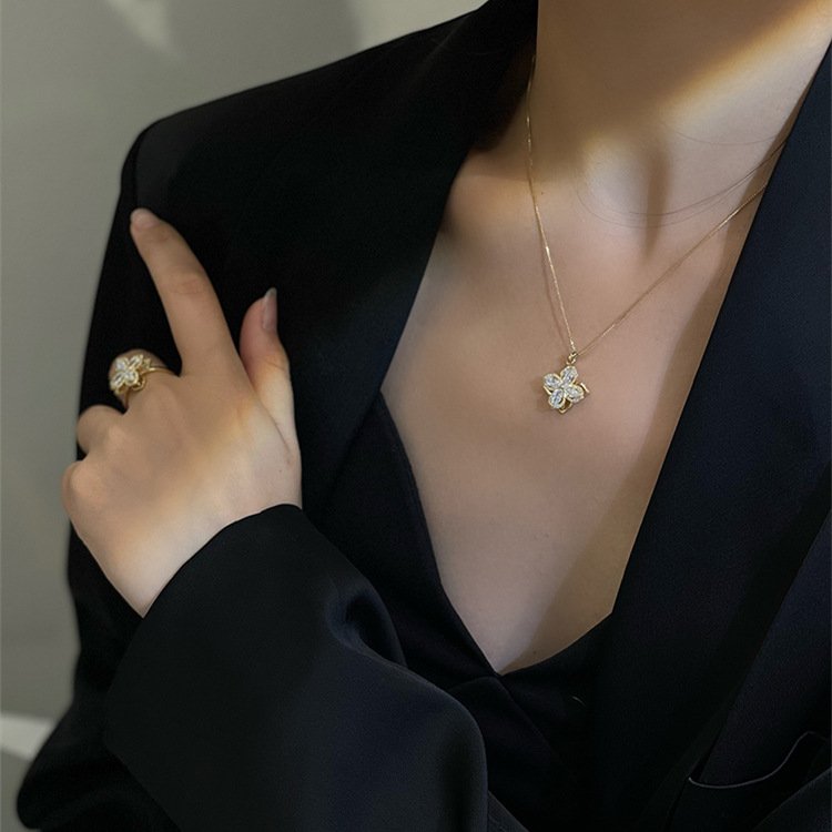 Rotating Clover Four Zirconia Ring & Necklace