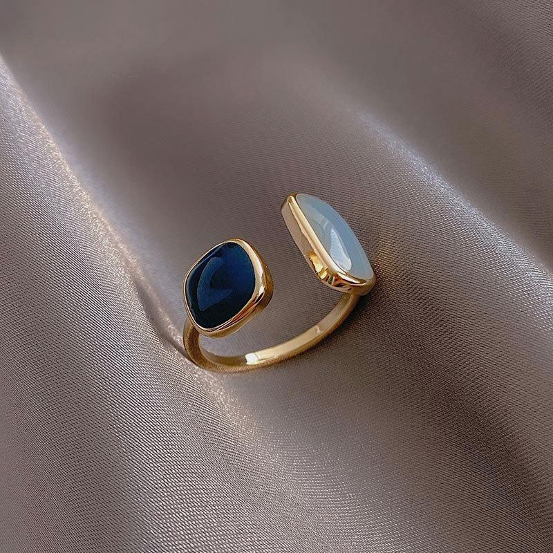 Elegant open ring with sapphire