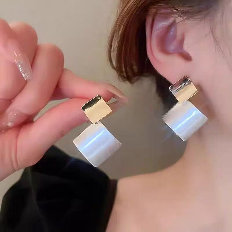 Square clashing earrings