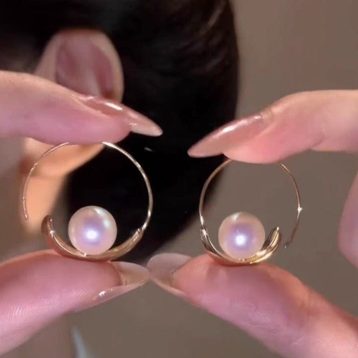 Large hoop pearl earrings