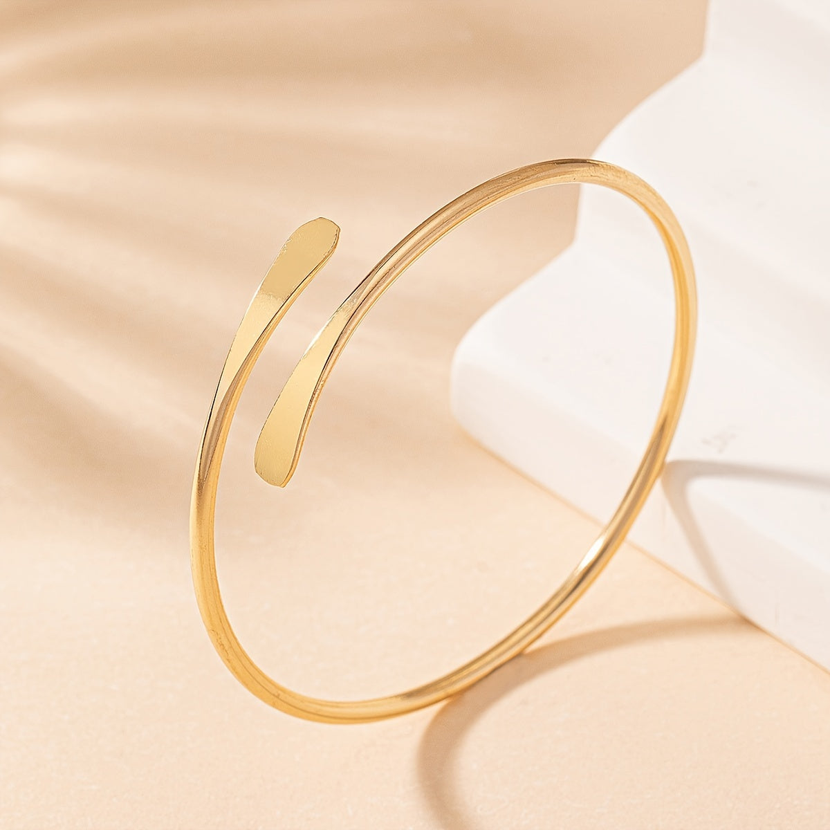 Silken Arc Minimal Gold Bangle for Casual Chic