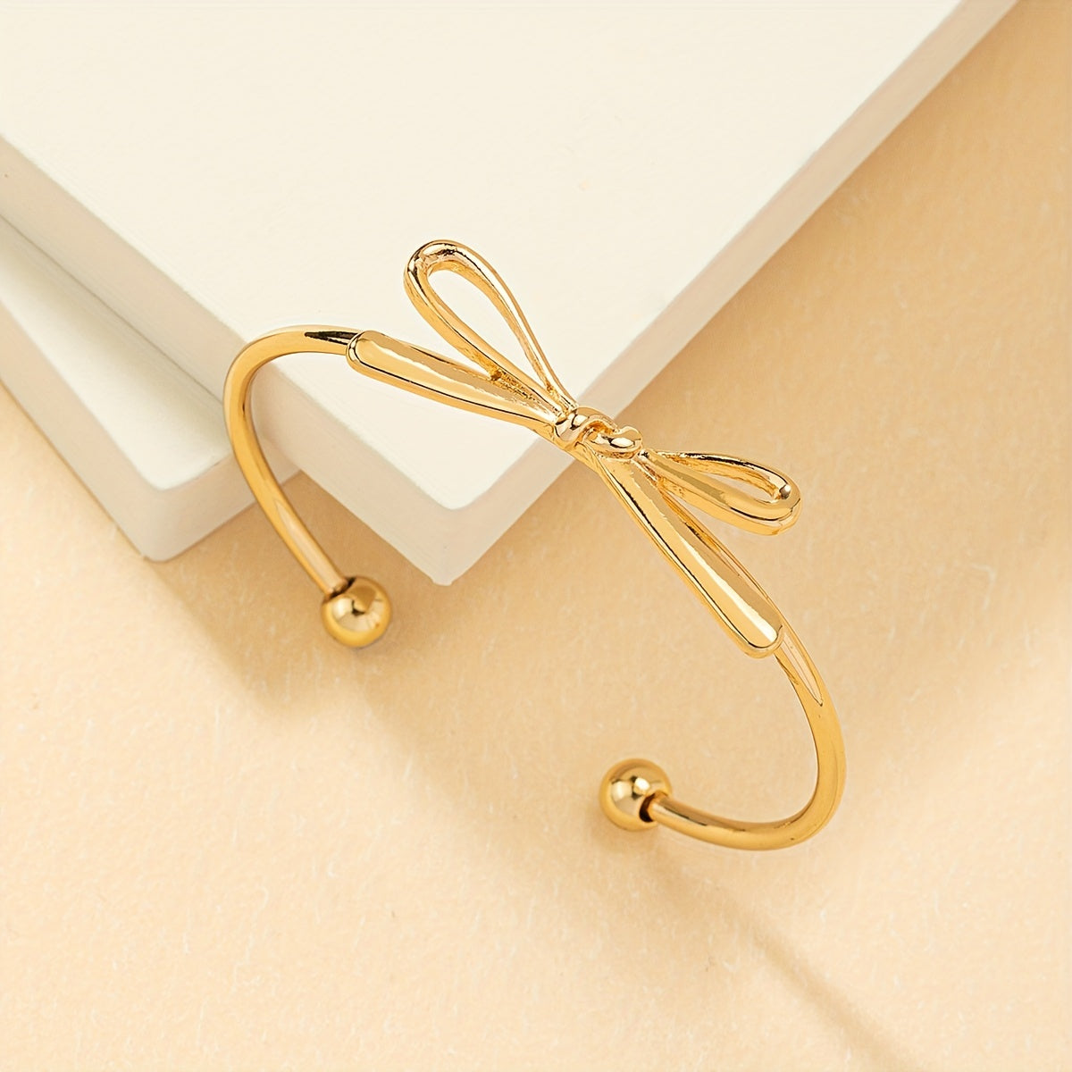 Vintage-Style Open Bangle with Simple Bow