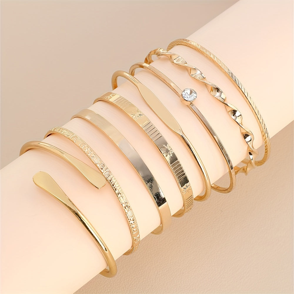 Elegant 8-Piece Gold Bangle Set – Twisted & Carved Designs with Rhinestones