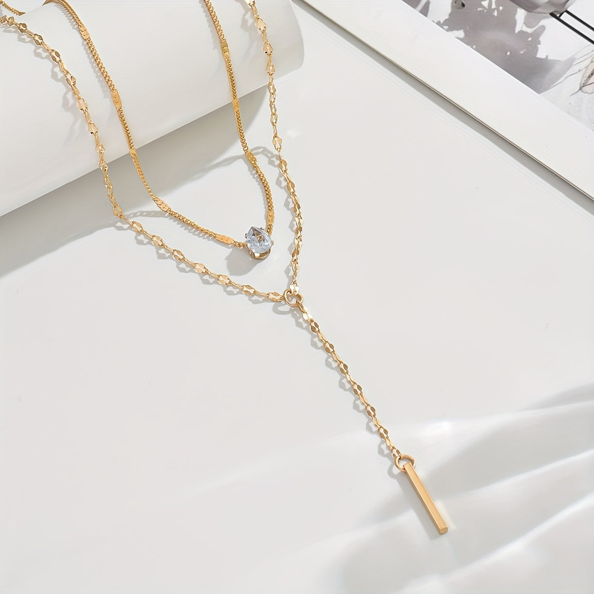 Golden Multi-Strand Pendant Necklace with Sparkling Rhinestone Accents