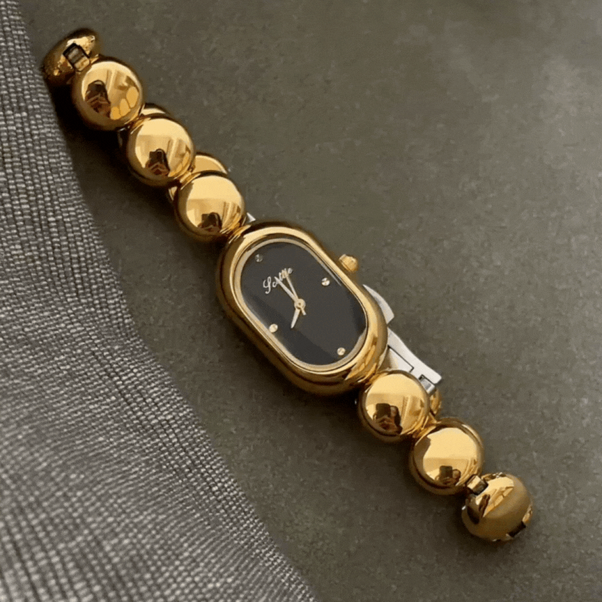 Gold Oval Quartz Watch for Women – Black Dial & Beaded Bracelet Design