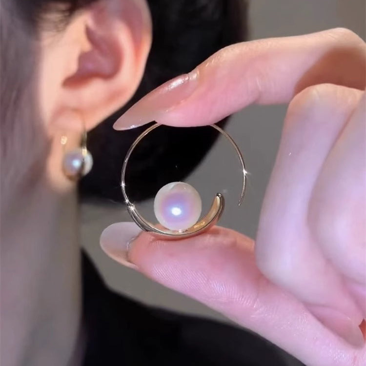 Large hoop pearl earrings