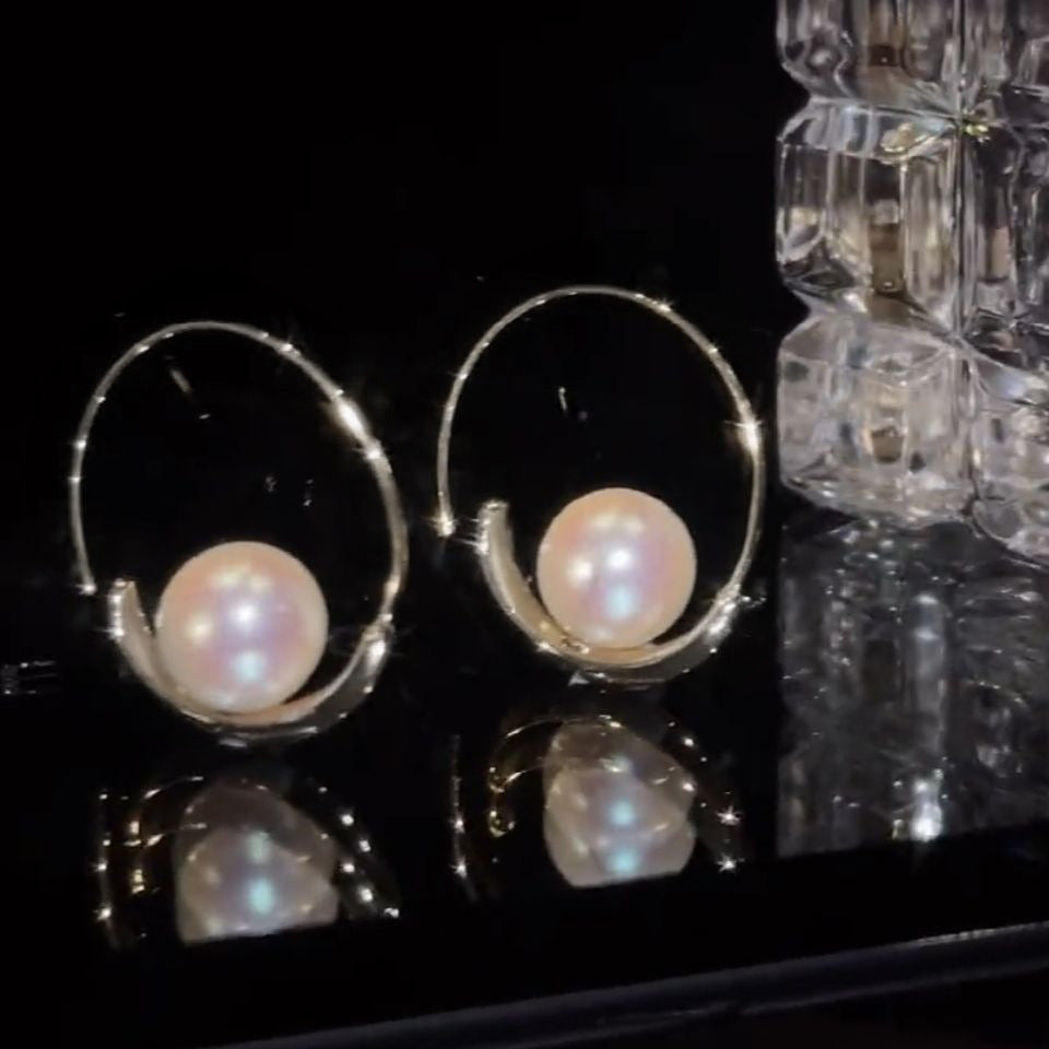 Large hoop pearl earrings