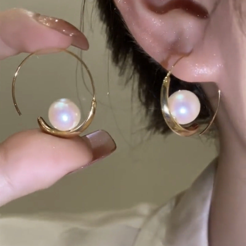 Large hoop pearl earrings