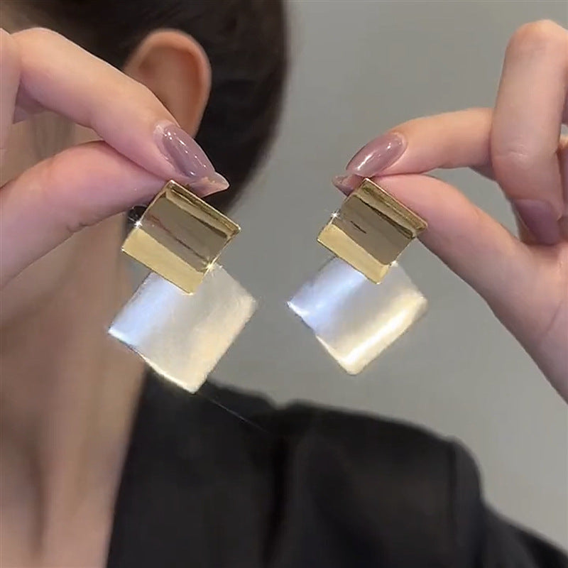 Square clashing earrings