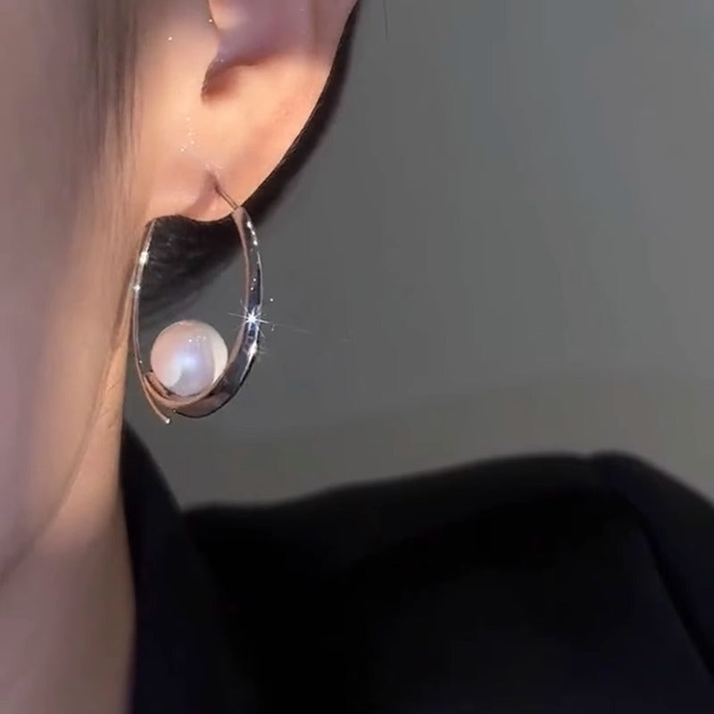 Large hoop pearl earrings