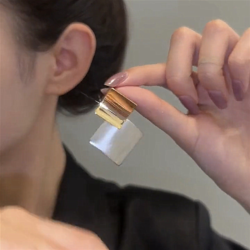 Square clashing earrings