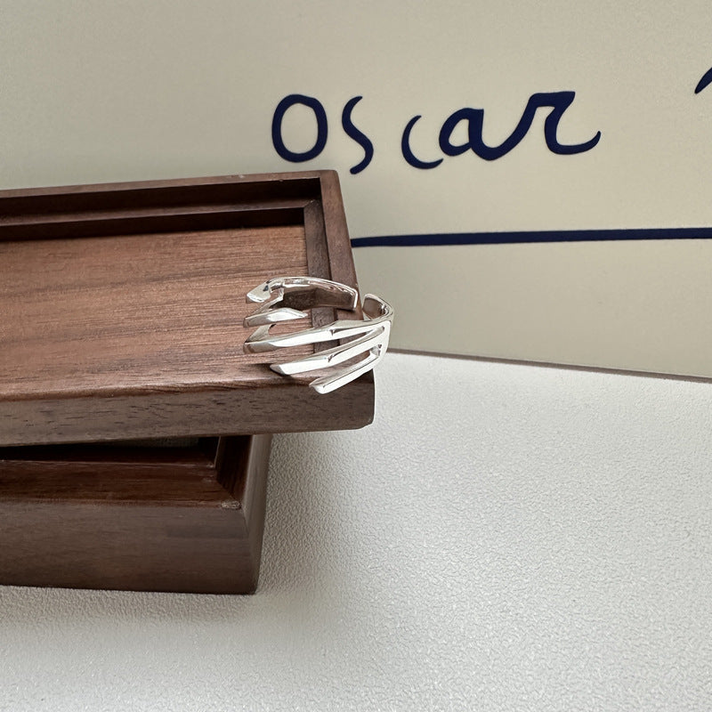 Sterling silver layered twill adjustable ring