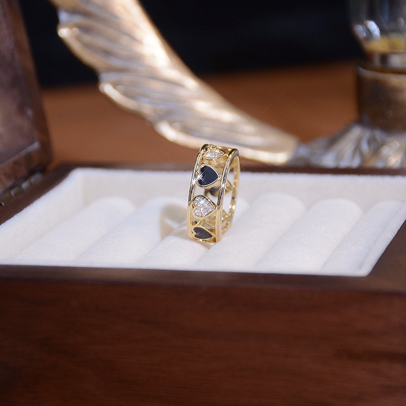 Openwork zirconia inlaid heart ring