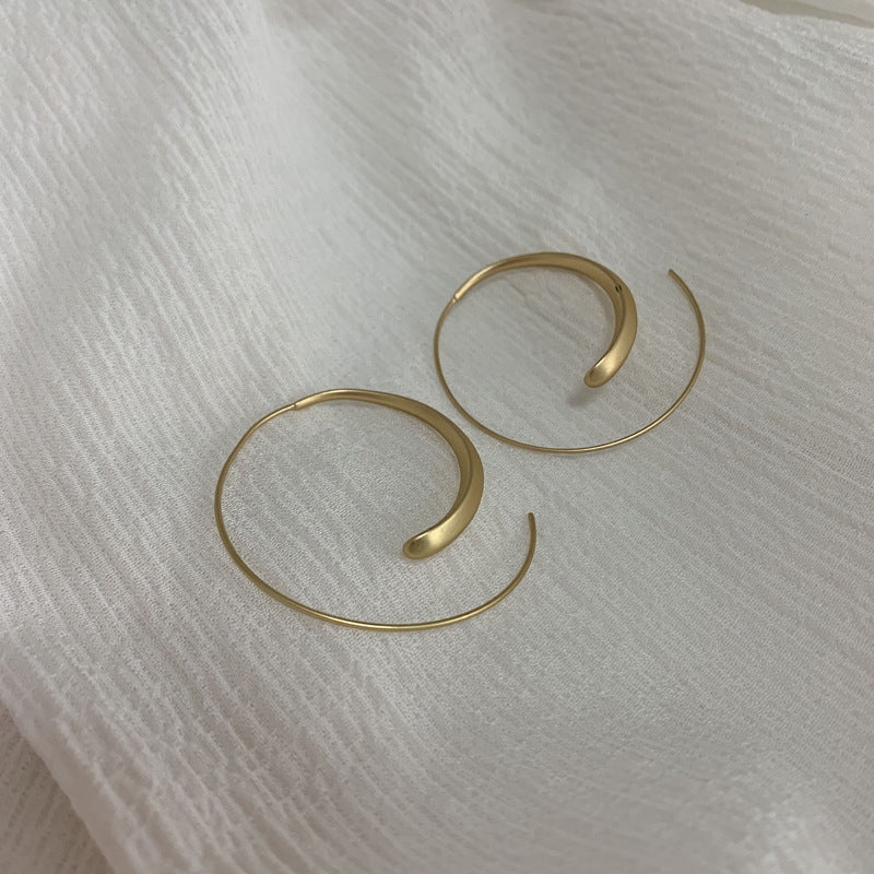 Large curved earrings