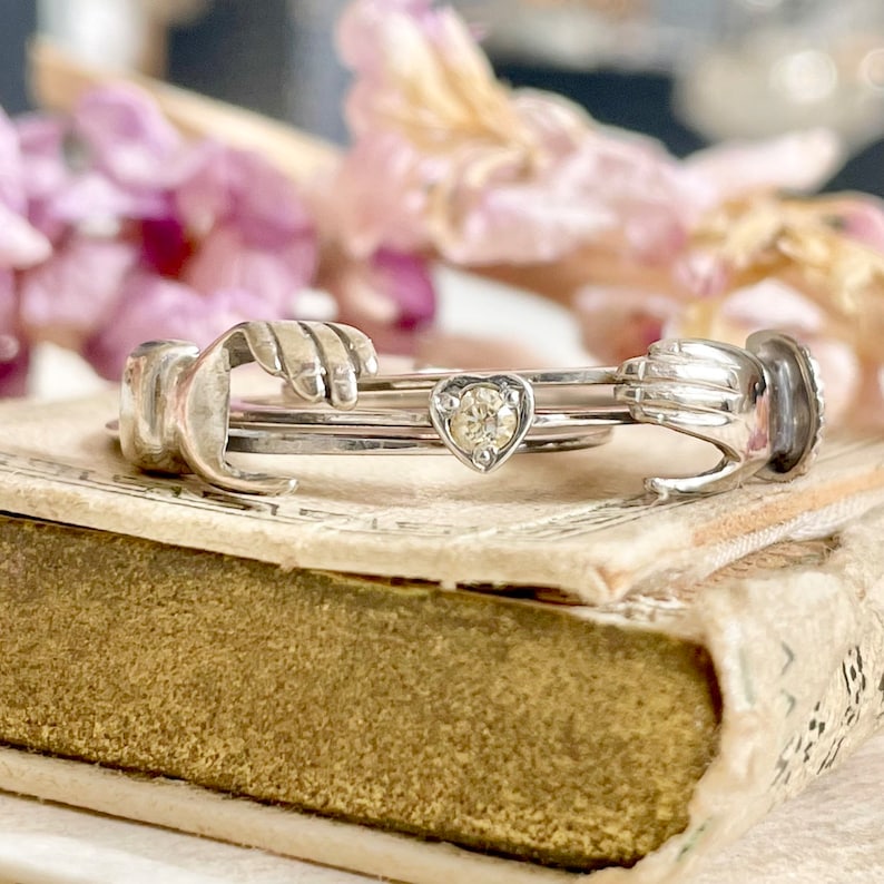 Vintage gimmel feather ring with hidden heart design