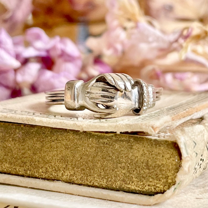 Vintage gimmel feather ring with hidden heart design