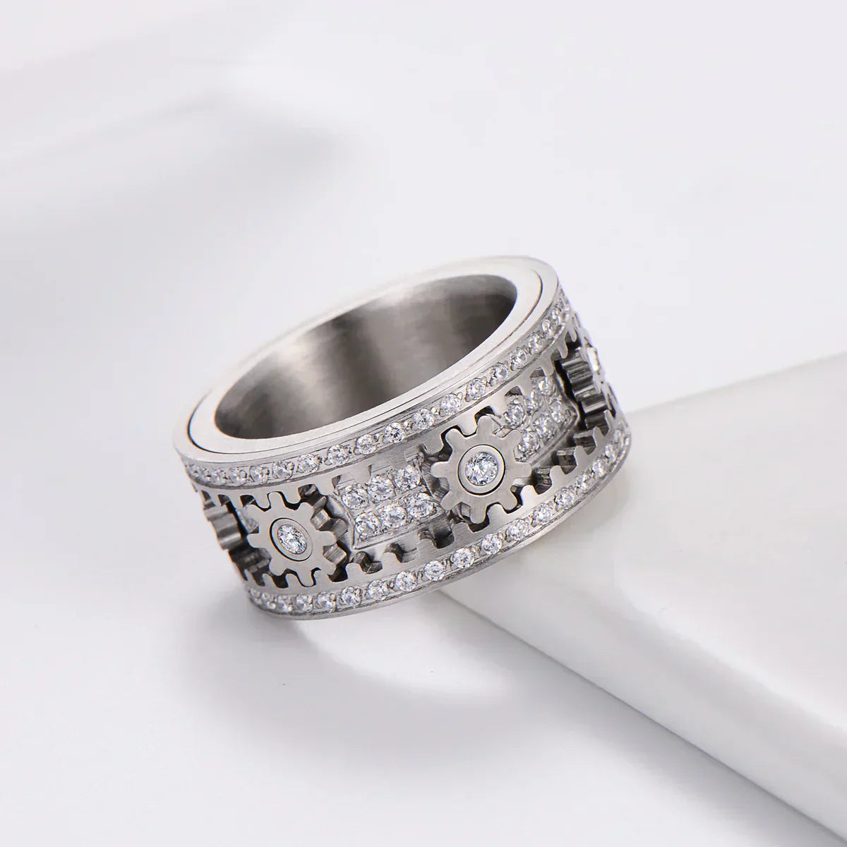 Pair relaxation ring - Fully set with diamonds, rotating gear design