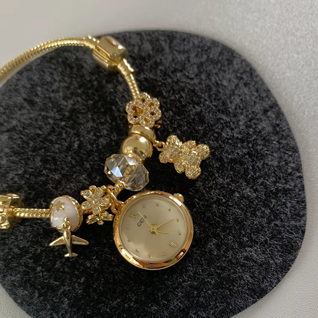 Bear & Plane Timepiece – Whimsical Gold Watch with Sparkling Zirconia