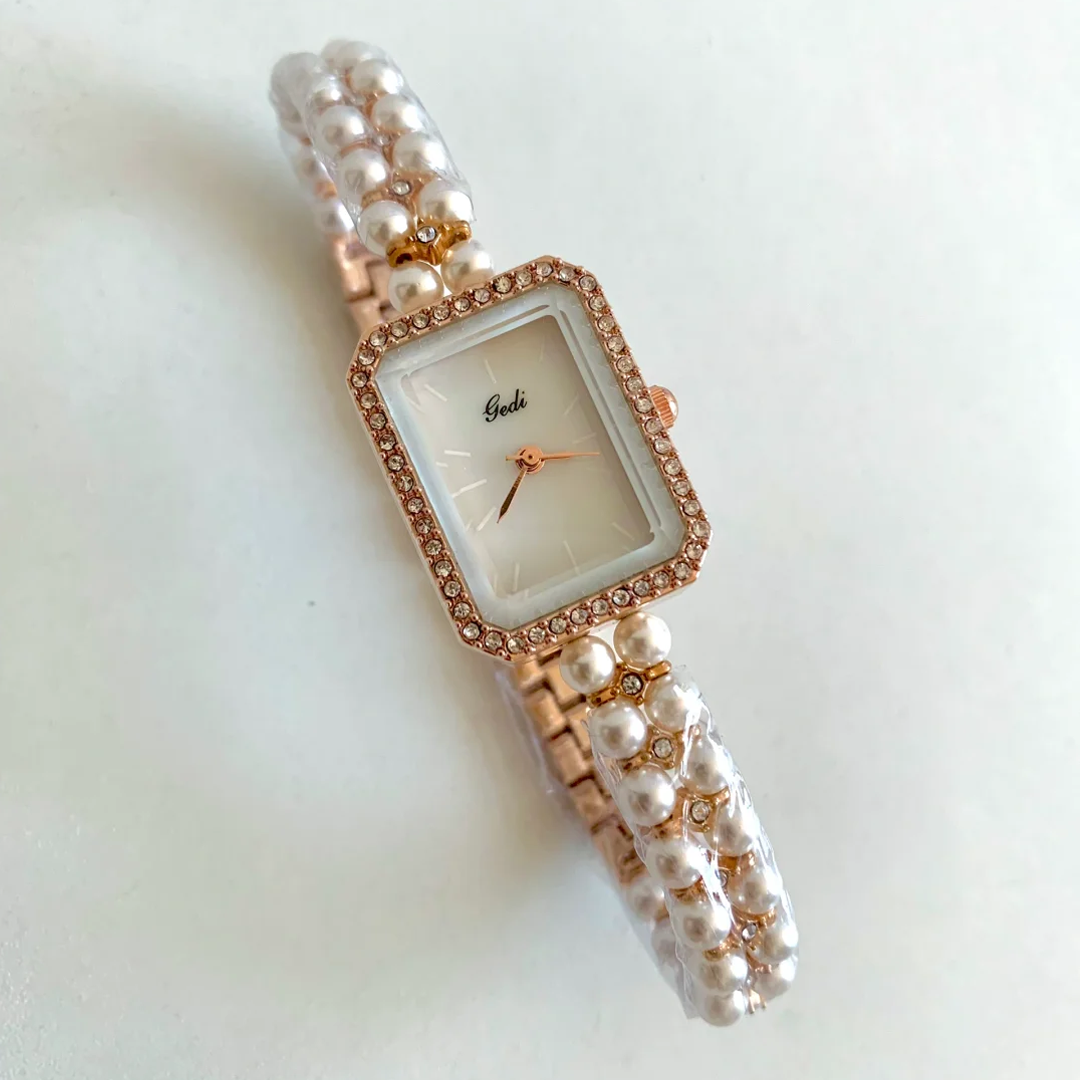 Chanel Charm Timepiece – Gold Mini Watch on Pearl-Linked Chain