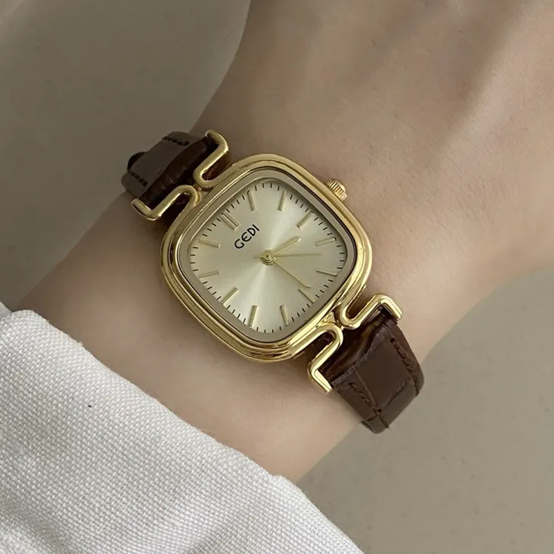 Golden Elegance Timepiece – Gold Dial Watch with Coffee Brown Strap