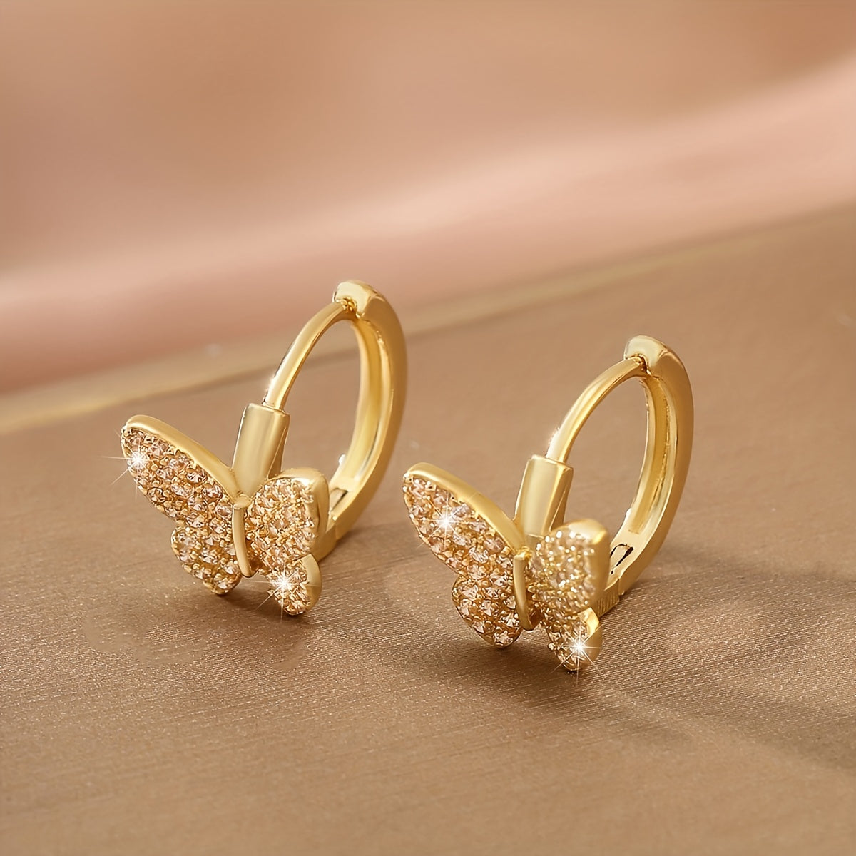 Wings of Elegance Cubic Zirconia Butterfly Hoops for Everyday Glamour