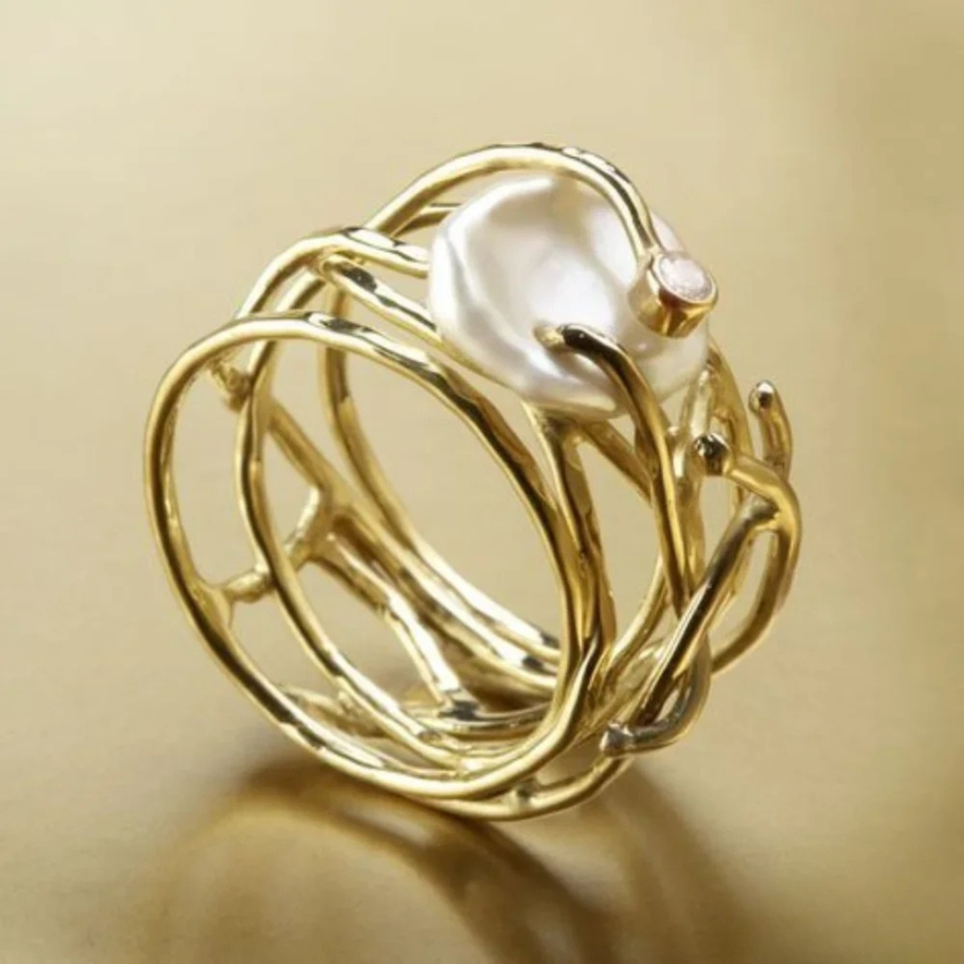 Gold ring with retro pearl