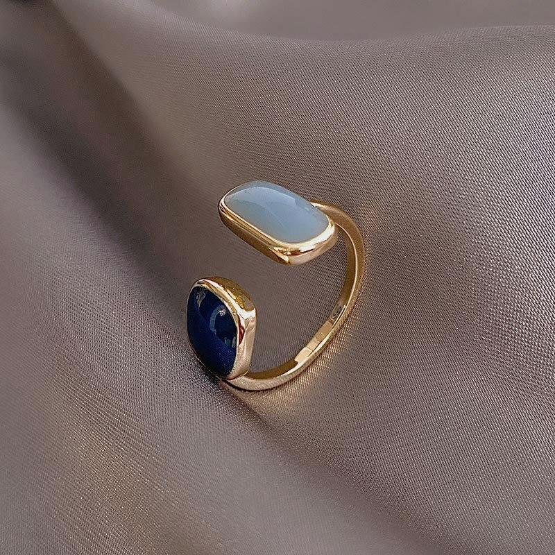 Elegant open ring with sapphire