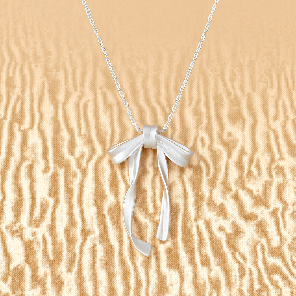 Elegant Ribbon Bow Pendant Necklace with Synthetic Stone