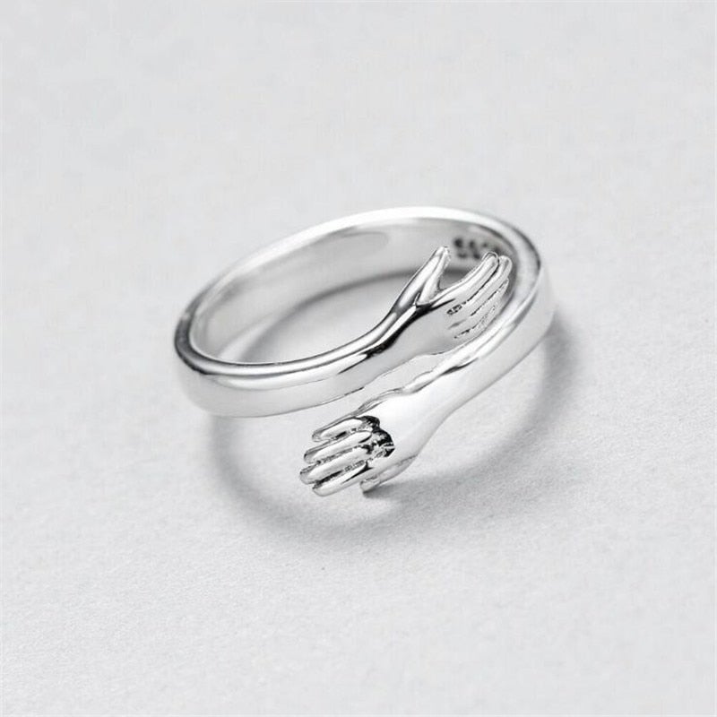 Adjustable silver hugging ring