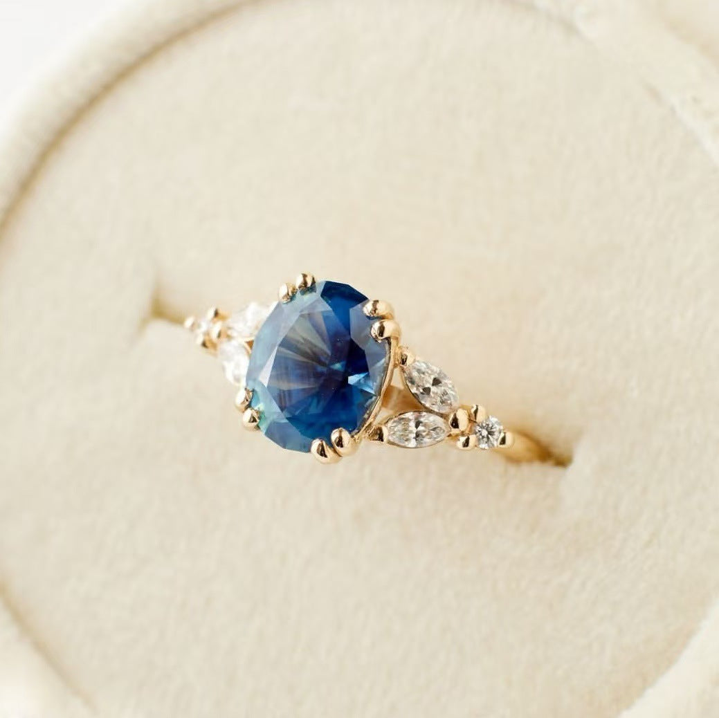 Gold Ring with Exotic Blue Crystal