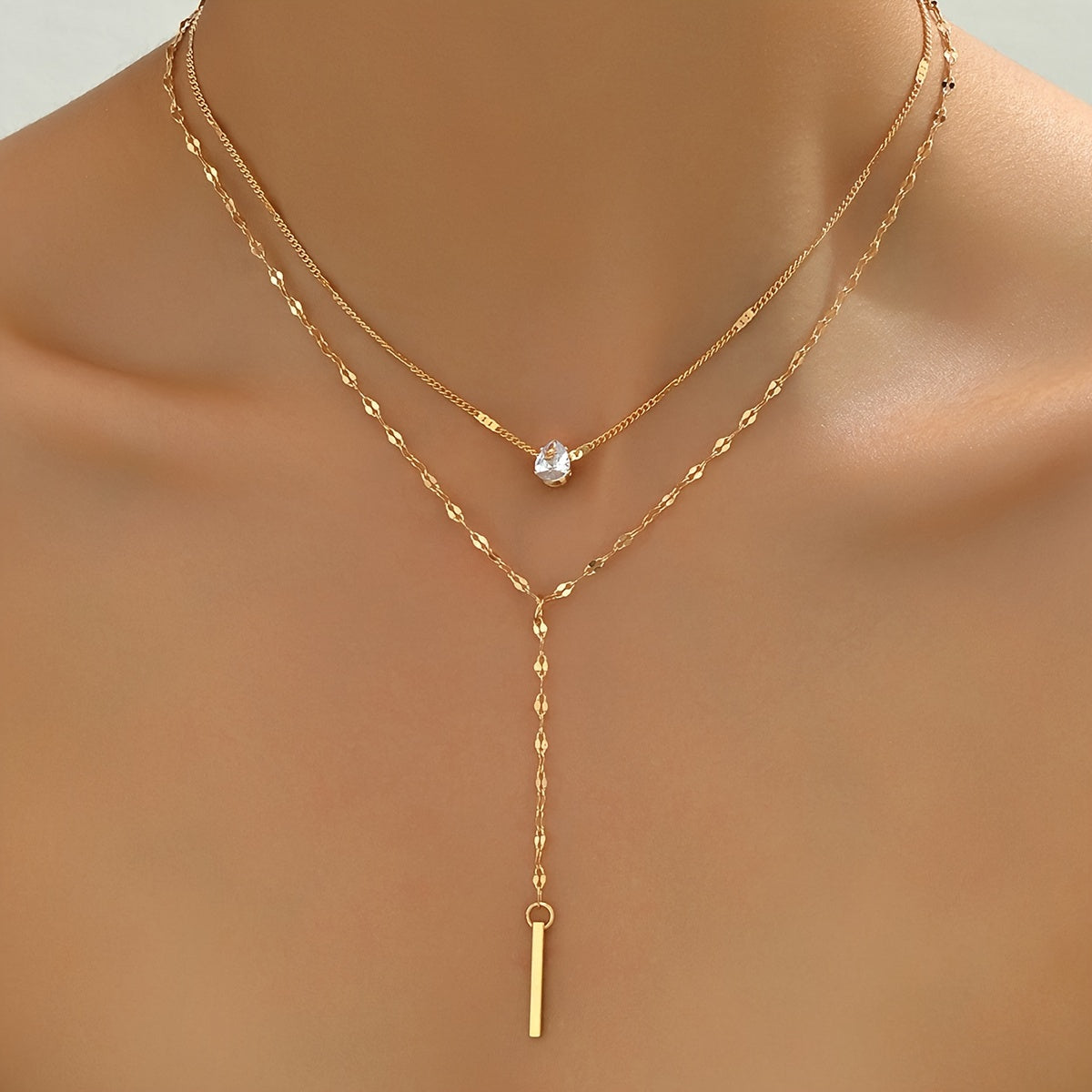 Golden Multi-Strand Pendant Necklace with Sparkling Rhinestone Accents
