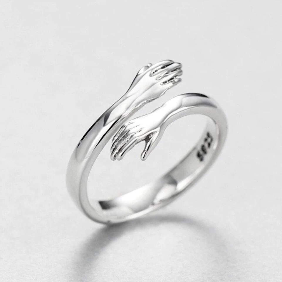Adjustable silver hugging ring