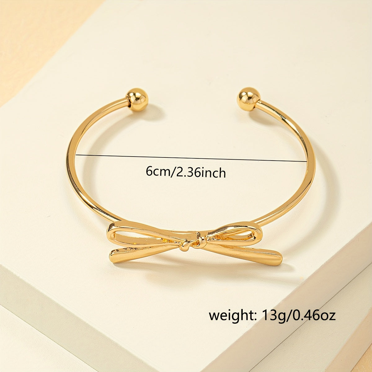Vintage-Style Open Bangle with Simple Bow