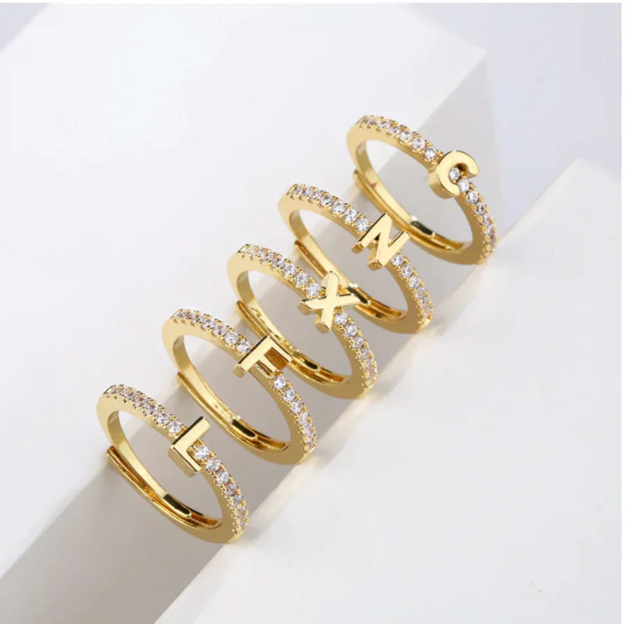 Adjustable custom initial ring