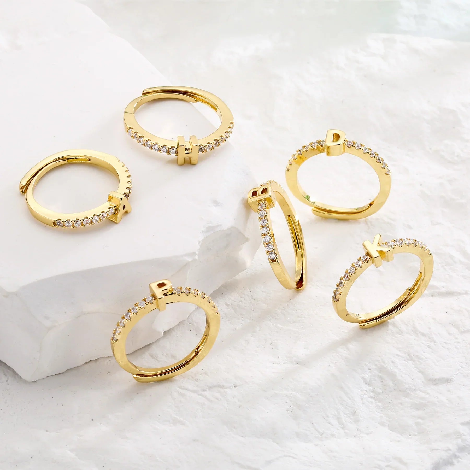 Adjustable custom initial ring