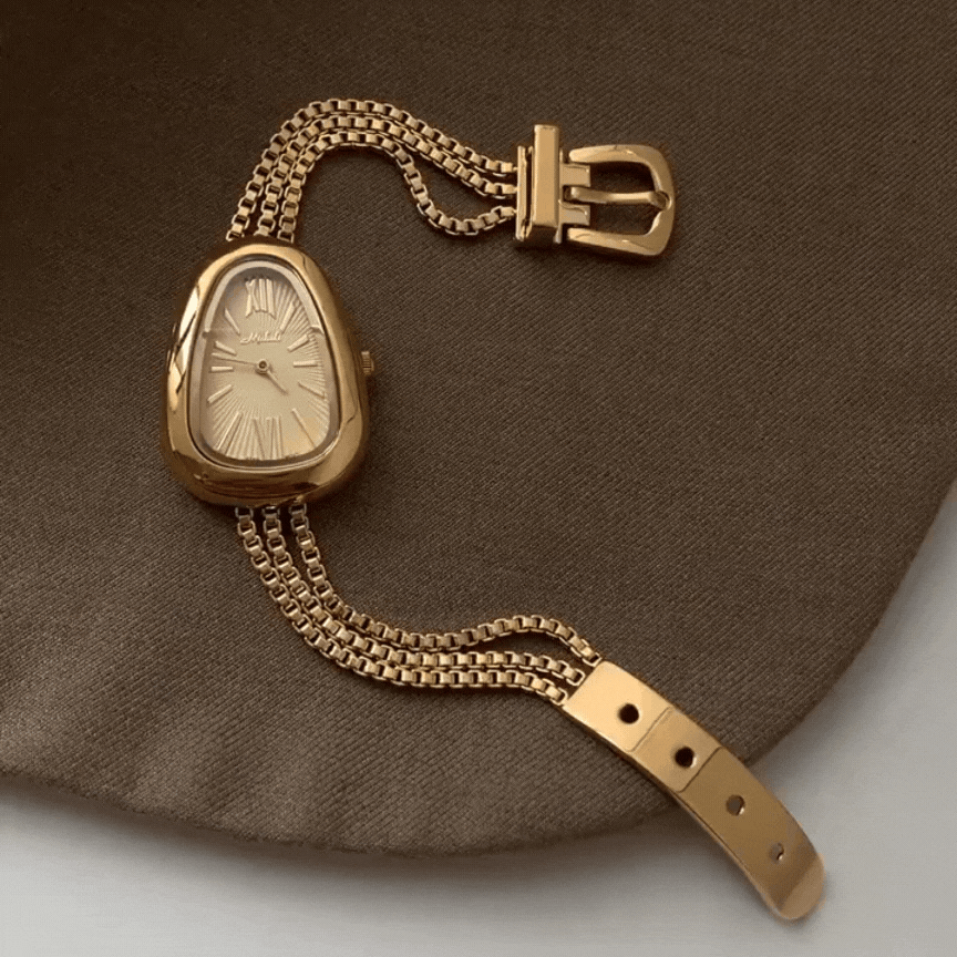 Golden Serpenti Timepiece – Quartz Watch with Steel Tassel Chain Design