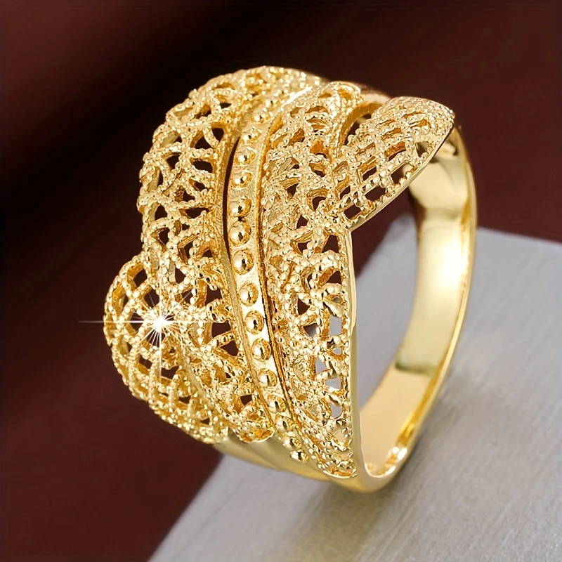 Gold Ring with Intricate Mesh Cut-Outs