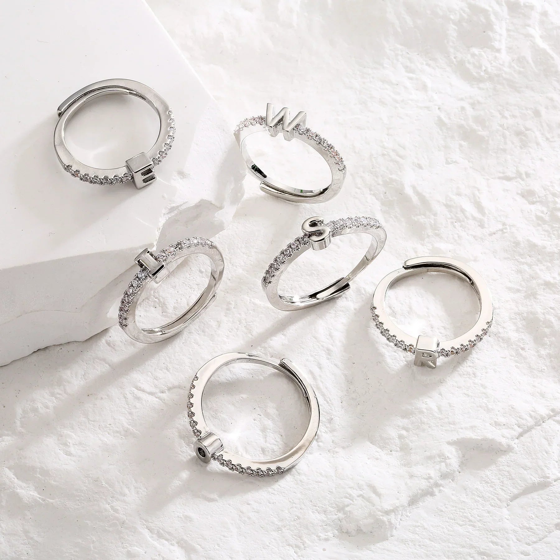 Adjustable custom initial ring